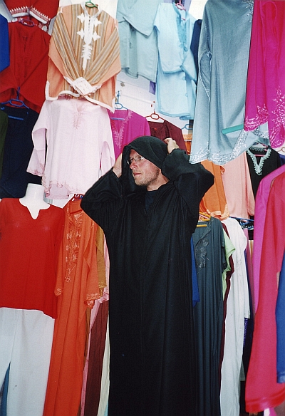 Marco shows a natural sense of wearing the right clothes at the right time. Souk in Marrakech