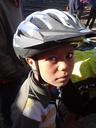 Boy with my bicycle helmet