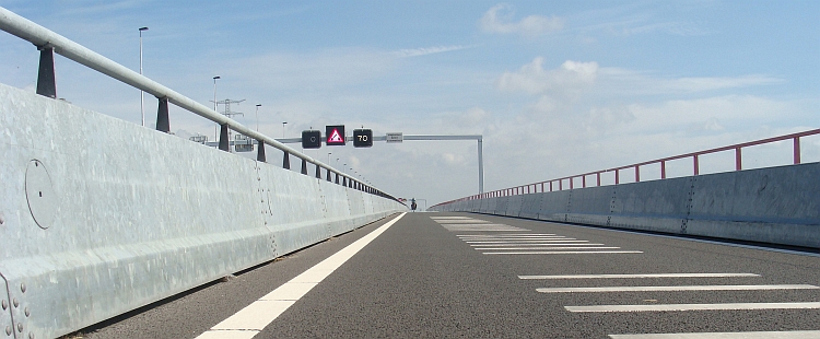 Willem, cycling across the Haringvliet Bridge towards the Island of Schouwen Duiveland