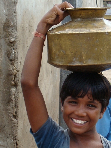 Boy with water bowl